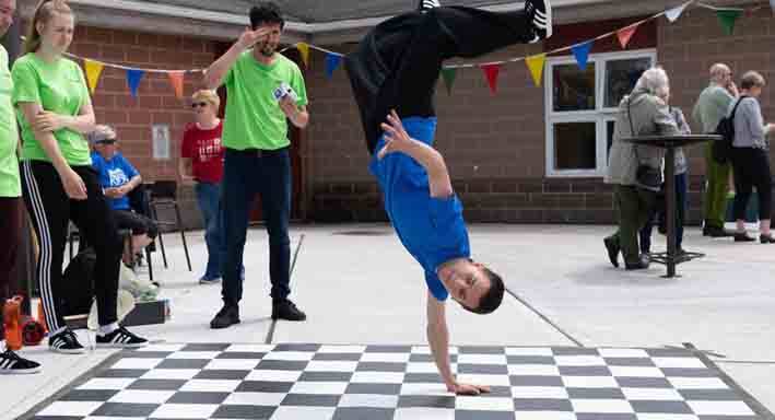 2.2 Halifax Public Libraries, Dartmouth North Branch-Outdoor Library. At the
June 2018 opening, break dancers set up and impressed many. Credit Halifax...